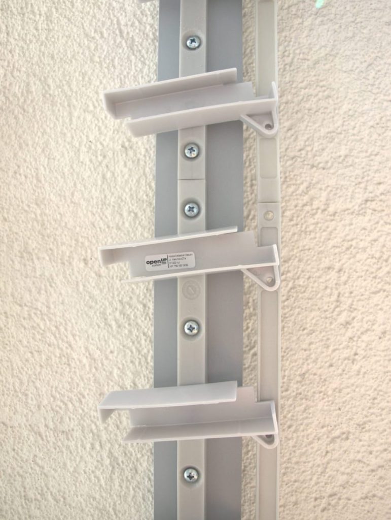 Handles for OpenUp System movable panels, made from polypropylene reinforced with glass fibre.